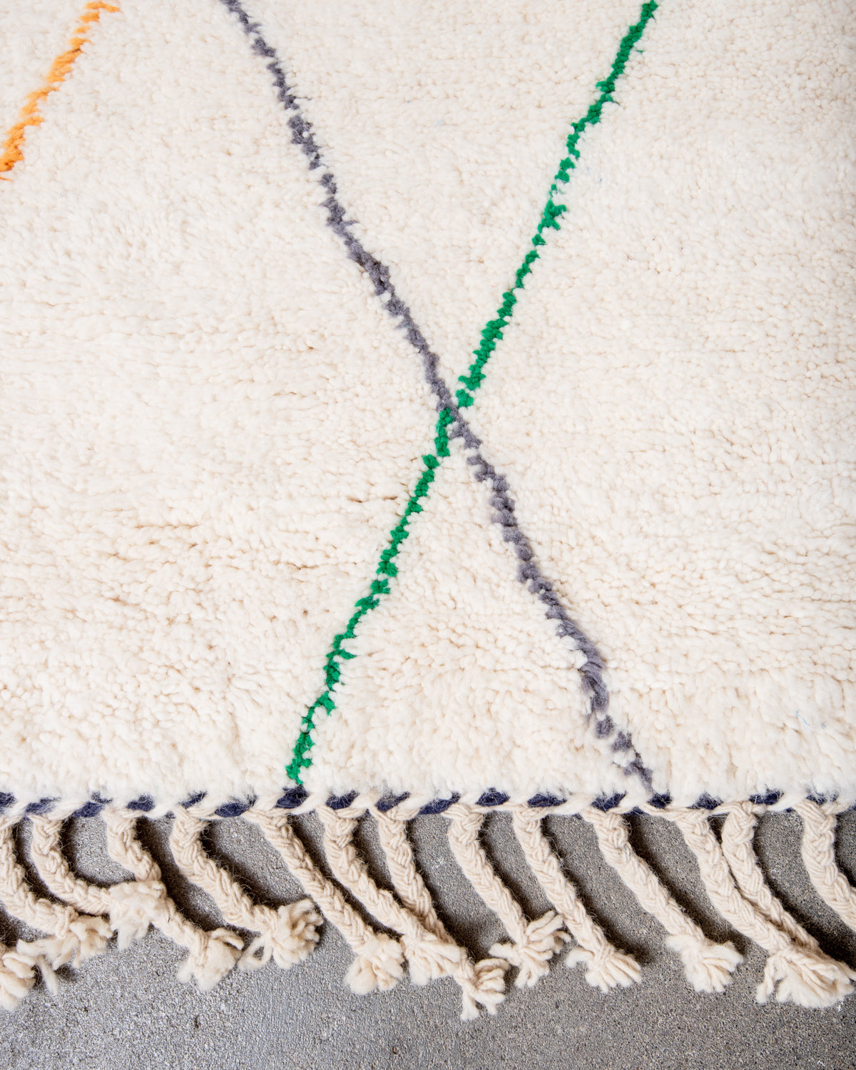Modern, designer, handcrafted Berber rug from Morocco. Beniourain carpet with beautiful colours and patterns and fluffy wool texture.